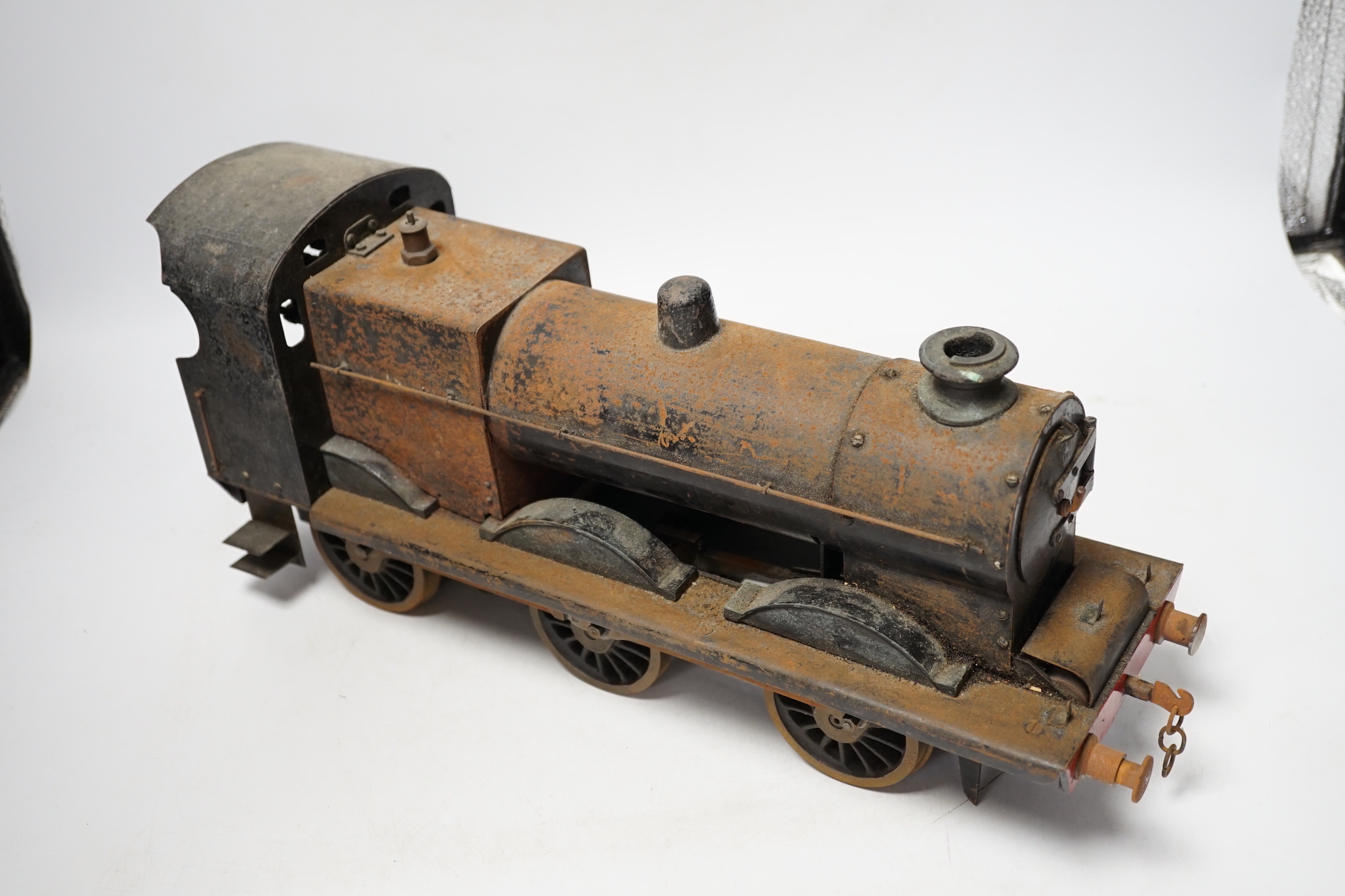 A paraffin/meths fired 2.5 inch live steam BR class 4F 0-6-0 tender locomotive, single inside cylinder, six wick burner, safety valve and whistle under running board, 72cm long over the buffers